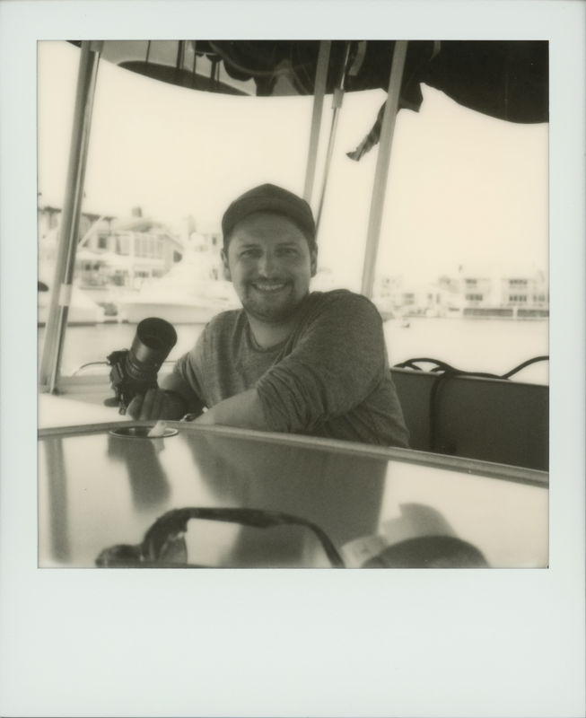 Alex With His Camera on Our Family's Boat