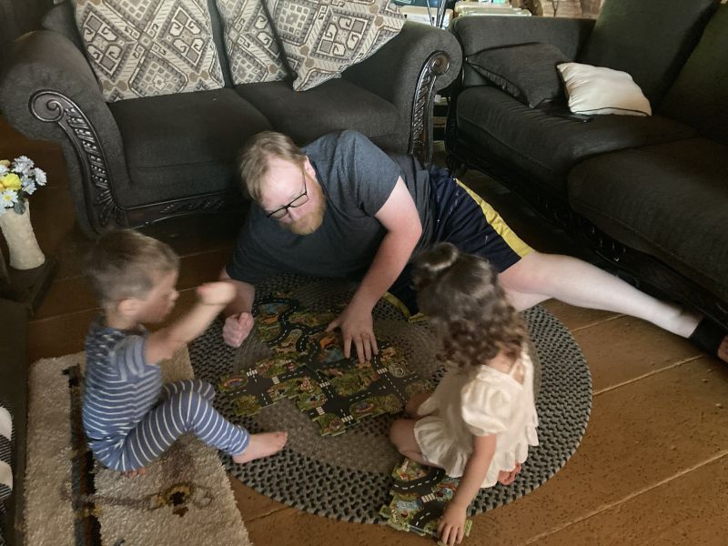 John Hanging Out with the Cousins at A Family Get Together