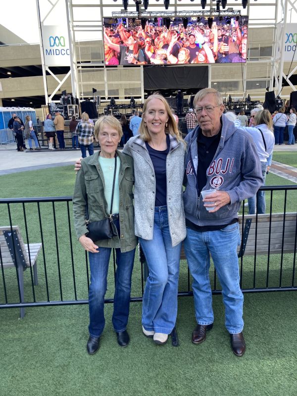 Steph with Her Parents at a Concert